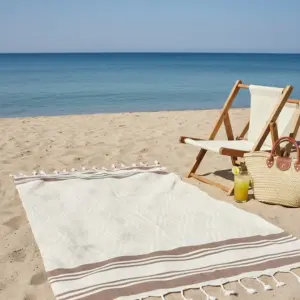 فوطة البحر "سمبل" التقليدية: أناقة البساطة ودفء الطبيعة من حرفة "الدرازة" في آسفي / Serviette de plage