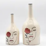 Duo de bouteille avec une décoration artistique ** قرعتان بزواق تشكيلي