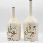 Duo de bouteille avec une décoration artistique ** قرعتان بزواق تشكيلي